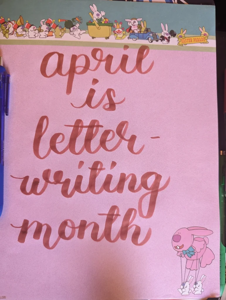 April is letter writing month text on pink sheet